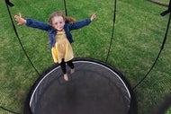 Girl jumping on a trampoline
