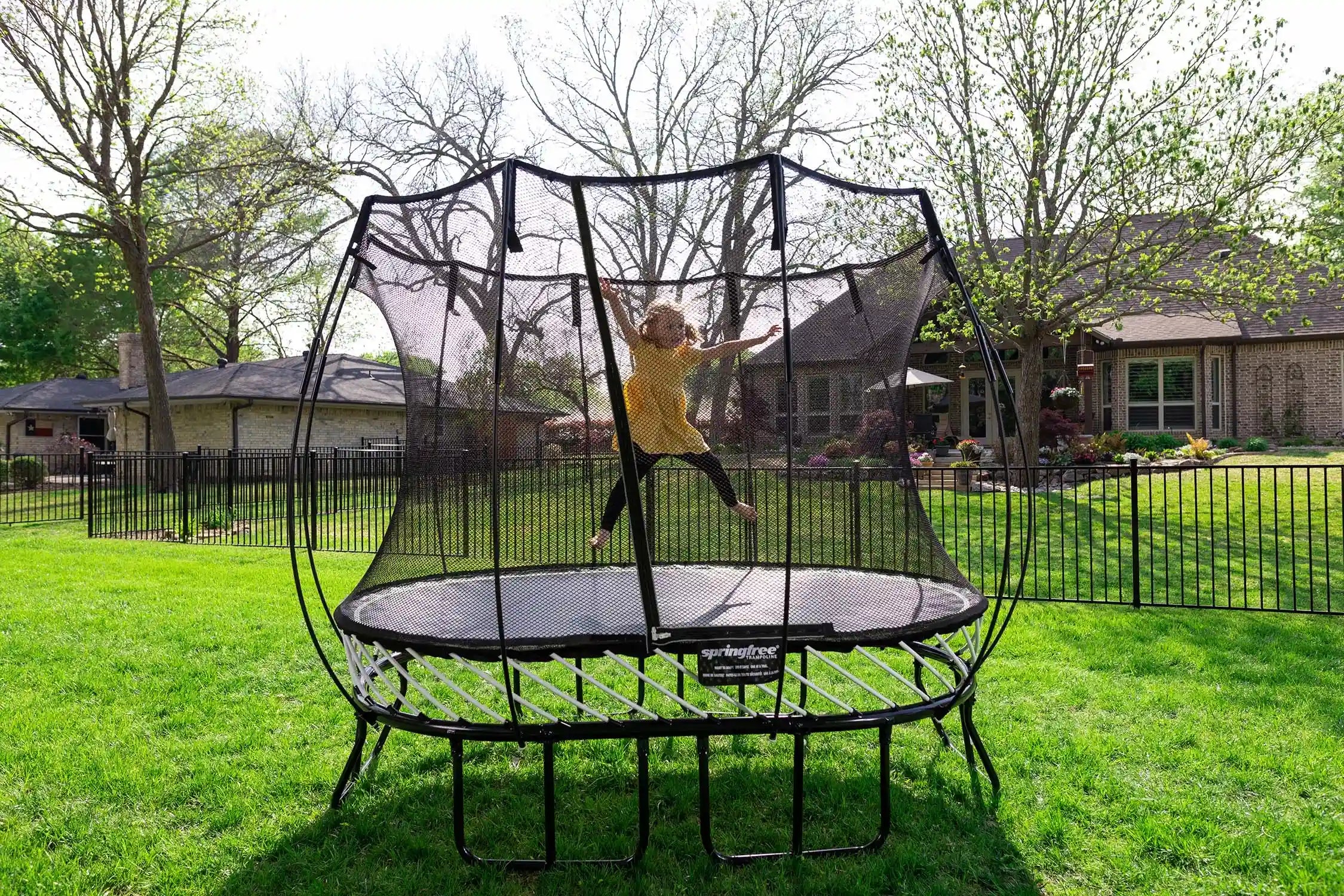 girl jumping on a trampoline